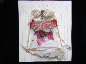 Innocence, from the series Cucas/Paper Dolls. Mixed Media. Handmade paper, reeds, fabric, found metals, metallic thread. Knitted wire, Polaroid transfer, machine stitching, hand embroidery. 2001.